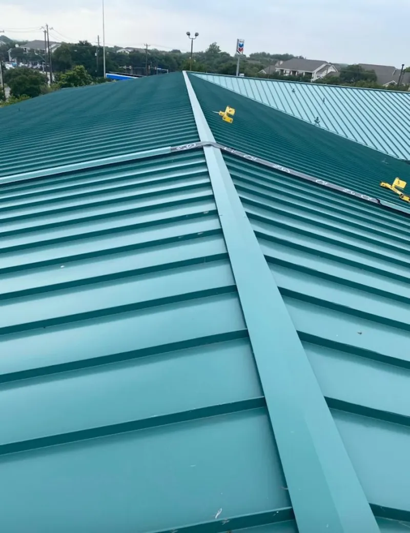 Green commercial metal roof ridge and valley for Metal Roof Repair in Chanute